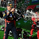 MEXICO CITY, MEXICO - OCTOBER 29: Race winner Max Verstappen of the Netherlands and Oracle Red Bull Racing, Second placed Lewis Hamilton of Great Britain and Mercedes and Third placed Charles Leclerc of Monaco and Ferrari celebrate on the podium after the F1 Grand Prix of Mexico at Autodromo Hermanos Rodriguez on October 29, 2023 in Mexico City, Mexico. (Photo by Mario Renzi - Formula 1/Formula 1 via Getty Images)