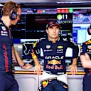 LUSAIL CITY, QATAR - OCTOBER 07: Sergio Perez of Mexico and Oracle Red Bull Racing prepares to drive in the garage prior to the Sprint ahead of the F1 Grand Prix of Qatar at Lusail International Circuit on October 07, 2023 in Lusail City, Qatar. (Photo by Mark Thompson/Getty Images)