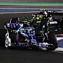 LUSAIL CITY, QATAR - OCTOBER 07: Pierre Gasly of France driving the (10) Alpine F1 A523 Renault leads Lewis Hamilton of Great Britain driving the (44) Mercedes AMG Petronas F1 Team W14 during the Sprint ahead of the F1 Grand Prix of Qatar at Lusail International Circuit on October 07, 2023 in Lusail City, Qatar. (Photo by Clive Rose/Getty Images)