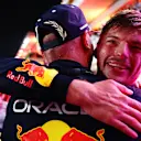 LUSAIL CITY, QATAR - OCTOBER 07: 2023 F1 World Drivers Champion Max Verstappen of the Netherlands and Oracle Red Bull Racing celebrates with a Red Bull Racing team member in parc ferme after the Sprint ahead of the F1 Grand Prix of Qatar at Lusail International Circuit on October 07, 2023 in Lusail City, Qatar. (Photo by Dan Istitene - Formula 1/Formula 1 via Getty Images)
