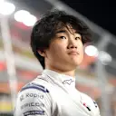 LUSAIL CITY, QATAR - OCTOBER 07: Yuki Tsunoda of Japan and Scuderia AlphaTauri looks on from the grid prior to the Sprint ahead of the F1 Grand Prix of Qatar at Lusail International Circuit on October 07, 2023 in Lusail City, Qatar. (Photo by Rudy Carezzevoli/Getty Images)