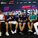 SINGAPORE, SINGAPORE - SEPTEMBER 14: Pierre Gasly of France and Alpine F1, Liam Lawson of New Zealand and Scuderia AlphaTauri, Max Verstappen of the Netherlands and Oracle Red Bull Racing, Fernando Alonso of Spain and Aston Martin F1 Team and Carlos Sainz of Spain and Ferrari  attend the Drivers Press Conference during previews ahead of the F1 Grand Prix of Singapore at Marina Bay Street Circuit on September 14, 2023 in Singapore, Singapore. (Photo by Clive Rose/Getty Images)