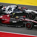 BARCELONA, SPAIN - JUNE 04: Zhou Guanyu of China driving the (24) Alfa Romeo F1 C43 Ferrari and Yuki Tsunoda of Japan driving the (22) Scuderia AlphaTauri AT04 battle for position during the F1 Grand Prix of Spain at Circuit de Barcelona-Catalunya on June 04, 2023 in Barcelona, Spain. (Photo by Dan Mullan - Formula 1/Formula 1 via Getty Images)