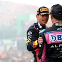 ZANDVOORT, NETHERLANDS - AUGUST 27: Race winner Max Verstappen of the Netherlands and Oracle Red Bull Racing and Third placed Pierre Gasly of France and Alpine F1 celebrate on the podium during the F1 Grand Prix of The Netherlands at Circuit Zandvoort on August 27, 2023 in Zandvoort, Netherlands. (Photo by Dan Istitene - Formula 1/Formula 1 via Getty Images)