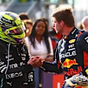 AUSTIN, TEXAS - OCTOBER 21: Sprint winner Max Verstappen of the Netherlands and Oracle Red Bull Racing shakes hands with Second placed Lewis Hamilton of Great Britain and Mercedes in parc ferme after the Sprint ahead of the F1 Grand Prix of United States at Circuit of The Americas on October 21, 2023 in Austin, Texas. (Photo by Mark Thompson/Getty Images)