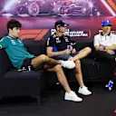 SINGAPORE, SINGAPORE - SEPTEMBER 19: Lance Stroll of Canada and Aston Martin F1 Team, Max Verstappen of the Netherlands and Oracle Red Bull Racing and Yuki Tsunoda of Japan and Visa Cash App RB attend the Drivers Press Conference during previews ahead of the F1 Grand Prix of Singapore at Marina Bay Street Circuit on September 19, 2024 in Singapore, Singapore. (Photo by Lars Baron/Getty Images)