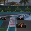 ABU DHABI, UNITED ARAB EMIRATES - DECEMBER 08: Lando Norris of Great Britain driving the (4) McLaren MCL38 Mercedes leads the field as Oscar Piastri of Australia driving the (81) McLaren MCL38 Mercedes and Max Verstappen of the Netherlands driving the (1) Oracle Red Bull Racing RB20 spin at the start during the F1 Grand Prix of Abu Dhabi at Yas Marina Circuit on December 08, 2024 in Abu Dhabi, United Arab Emirates. (Photo by Rudy Carezzevoli/Getty Images)