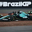 SAO PAULO, BRAZIL - NOVEMBER 03: Lance Stroll of Canada driving the (18) Aston Martin AMR24 Mercedes beaches his car in the gravel during the F1 Grand Prix of Brazil at Autodromo Jose Carlos Pace on November 03, 2024 in Sao Paulo, Brazil. (Photo by Clive Mason/Getty Images)
