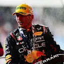 SAO PAULO, BRAZIL - NOVEMBER 03: Race winner Max Verstappen of the Netherlands and Oracle Red Bull Racing celebrates on the podium after the F1 Grand Prix of Brazil at Autodromo Jose Carlos Pace on November 03, 2024 in Sao Paulo, Brazil. (Photo by Mario Renzi - Formula 1/Formula 1 via Getty Images)