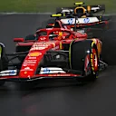 MONTREAL, QUEBEC - JUNE 09: Carlos Sainz of Spain driving (55) the Ferrari SF-24 leads Sergio Perez of Mexico driving the (11) Oracle Red Bull Racing RB20 on track during the F1 Grand Prix of Canada at Circuit Gilles Villeneuve on June 09, 2024 in Montreal, Quebec. (Photo by Rudy Carezzevoli/Getty Images)