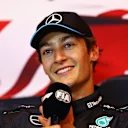 MONTREAL, QUEBEC - JUNE 08: Pole position qualifier George Russell of Great Britain and Mercedes attends the press conference after qualifying ahead of the F1 Grand Prix of Canada at Circuit Gilles Villeneuve on June 08, 2024 in Montreal, Quebec. (Photo by Clive Rose/Getty Images)