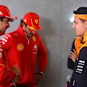 SHANGHAI, CHINA - APRIL 21: Lando Norris of Great Britain and McLaren, Charles Leclerc of Monaco and Ferrari and Carlos Sainz of Spain and Ferrari talk during the drivers parade prior to the F1 Grand Prix of China at Shanghai International Circuit on April 21, 2024 in Shanghai, China. (Photo by Bryn Lennon - Formula 1/Formula 1 via Getty Images)