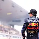 SHANGHAI, CHINA - APRIL 21: Third placed Sergio Perez of Mexico and Oracle Red Bull Racing celebrates with trophy on the podium after the F1 Grand Prix of China at Shanghai International Circuit on April 21, 2024 in Shanghai, China. (Photo by Bryn Lennon - Formula 1/Formula 1 via Getty Images)