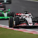 SHANGHAI, CHINA - APRIL 20: Kevin Magnussen of Denmark driving the (20) Haas F1 VF-24 Ferrari leads Valtteri Bottas of Finland driving the (77) Kick Sauber C44 Ferrari on track during the Sprint ahead of the F1 Grand Prix of China at Shanghai International Circuit on April 20, 2024 in Shanghai, China. (Photo by Lintao Zhang/Getty Images )
