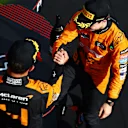 BUDAPEST, HUNGARY - JULY 21: Race winner Oscar Piastri of Australia and McLaren and Second placed Lando Norris of Great Britain and McLaren celebrate on the podium during the F1 Grand Prix of Hungary at Hungaroring on July 21, 2024 in Budapest, Hungary. (Photo by Mark Thompson/Getty Images)