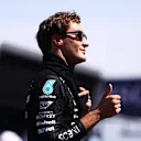 SUZUKA, JAPAN - APRIL 07: George Russell of Great Britain and Mercedes reacts on the grid prior to the F1 Grand Prix of Japan at Suzuka International Racing Course on April 07, 2024 in Suzuka, Japan. (Photo by Bryn Lennon - Formula 1/Formula 1 via Getty Images)