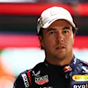LAS VEGAS, NEVADA - NOVEMBER 22: 16th placed qualifier Sergio Perez of Mexico and Oracle Red Bull Racing walks in the Pitlane during qualifying ahead of the F1 Grand Prix of Las Vegas at Las Vegas Strip Circuit on November 22, 2024 in Las Vegas, Nevada. (Photo by Clive Rose - Formula 1/Formula 1 via Getty Images)