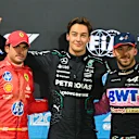 LAS VEGAS, NEVADA - NOVEMBER 22: Pole position qualifier George Russell of Great Britain and Mercedes (C), Second placed qualifier Carlos Sainz of Spain and Ferrari (L) and Third placed qualifier Pierre Gasly of France and Alpine F1 (R) pose for a photo in parc ferme during qualifying ahead of the F1 Grand Prix of Las Vegas at Las Vegas Strip Circuit on November 22, 2024 in Las Vegas, Nevada. (Photo by Mark Sutton - Formula 1/Formula 1 via Getty Images)