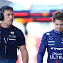 MIAMI, FLORIDA - MAY 04: 17th placed qualifier Logan Sargeant of United States and Williams walks in the Pitlane during qualifying ahead of the F1 Grand Prix of Miami at Miami International Autodrome on May 04, 2024 in Miami, Florida. (Photo by Clive Rose - Formula 1/Formula 1 via Getty Images)