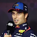 JEDDAH, SAUDI ARABIA - MARCH 08: Third placed qualifier Sergio Perez of Mexico and Oracle Red Bull Racing talks in a press conference after qualifying ahead of the F1 Grand Prix of Saudi Arabia at Jeddah Corniche Circuit on March 08, 2024 in Jeddah, Saudi Arabia. (Photo by Bryn Lennon/Getty Images)