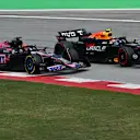 BARCELONA, SPAIN - JUNE 23: Sergio Perez of Mexico driving the (11) Oracle Red Bull Racing RB20 leads Esteban Ocon of France driving the (31) Alpine F1 A524 Renault  during the F1 Grand Prix of Spain at Circuit de Barcelona-Catalunya on June 23, 2024 in Barcelona, Spain. (Photo by Mark Sutton - Formula 1/Formula 1 via Getty Images)