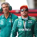 BARCELONA, SPAIN - JUNE 22: 11th placed qualifier Fernando Alonso of Spain and Aston Martin F1 Team walks in the Pitlane during qualifying ahead of the F1 Grand Prix of Spain at Circuit de Barcelona-Catalunya on June 22, 2024 in Barcelona, Spain. (Photo by Clive Rose - Formula 1/Formula 1 via Getty Images)