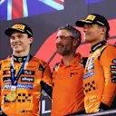 BAHRAIN, BAHRAIN - APRIL 13: Race winner Oscar Piastri of Australia and McLaren Andrea Stella, Team Principal of McLaren and Third placed Lando Norris of Great Britain and McLaren on the podium during the F1 Grand Prix of Bahrain at Bahrain International Circuit on April 13, 2025 in Bahrain, Bahrain. (Photo by Malcolm Griffiths - Formula 1/Formula 1 via Getty Images)