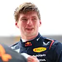 MIAMI, FLORIDA - MAY 03: Pole position qualifier Max Verstappen of the Netherlands and Oracle Red Bull Racing looks on in parc ferme during qualifying ahead of the F1 Grand Prix of Miami at Miami International Autodrome on May 03, 2025 in Miami, Florida. (Photo by Bryn Lennon - Formula 1/Formula 1 via Getty Images)