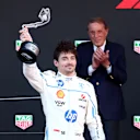 MONTE-CARLO, MONACO - MAY 25: Second placed Charles Leclerc of Monaco and Scuderia Ferrari lifts his trophy in celebration during the F1 Grand Prix of Monaco at Circuit de Monaco on May 25, 2025 in Monte-Carlo, Monaco. (Photo by Clive Rose/Getty Images)