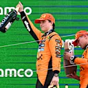 BARCELONA, SPAIN - JUNE 01: Race winner Oscar Piastri of Australia and McLaren and Second placed Lando Norris of Great Britain and McLaren on the podium during the F1 Grand Prix of Spain at Circuit de Barcelona-Catalunya on June 01, 2025 in Barcelona, Spain. (Photo by Mark Sutton - Formula 1/Formula 1 via Getty Images)