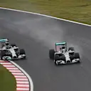 Lewis Hamilton (GBR) Mercedes AMG F1 W05 overtakes Nico Rosberg (GER) Mercedes AMG F1 W05 for the lead of the race. Formula One World Championship, Rd15, Japanese Grand Prix, Race, Suzuka, Japan, Sunday, 5 October 2014 © Sutton Images. No reproduction without permission