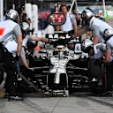 Kevin Magnussen (DEN) McLaren MP4-29 makes a pit stop. Formula One World Championship, Rd15, Japanese Grand Prix, Practice, Suzuka, Japan, Friday, 3 October 2014 © Sutton Images. No reproduction without permission