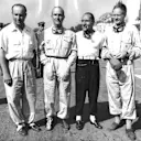 The Alfa Romeo team before the start. (L-R) Juan Manuel Fangio, Giuseppe Farina, Felice Bonetto and Emmanuel de Graffenried. 1950 Italian Grand Prix. Monza, Italy. © LAT Photographic
