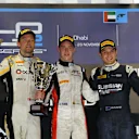 Race one podium (L to R): Second placed Jolyon Palmer (GBR) DAMS, race winner Stoffel Vandoorne (BEL) ART Grand Prix and third placed Mitch Evans (NZL) Russian Time. GP2 Series, Rd11, Yas Marina Circuit, Abu Dhabi, UAE, 21-23 November 2014