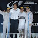 (L to R): Felipe Massa (BRA) Williams, Toto Wolff (AUT) Mercedes AMG F1 Director of Motorsport, race winner Lewis Hamilton (GBR) Mercedes AMG F1 and Valtteri Bottas (FIN) Williams celebrates on the podium. Formula One World Championship, Rd19, Abu Dhabi Grand Prix, Race, Yas Marina Circuit, Abu Dhabi, UAE, Sunday, 23 November 2014