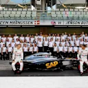 Kevin Magnussen (DEN) McLaren and Jenson Button (GBR) McLaren at the McLaren Team Photo. Formula One World Championship, Rd19, Abu Dhabi Grand Prix, Preparations, Yas Marina Circuit, Abu Dhabi, UAE, Thursday, 20 November 2014 