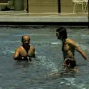 (L to R): Fifth placed Denny Hulme (NZL) and second placed Francois Cevert (FRA) relax in the hotel swimming pool before the first round of the season. Argentinean Grand Prix, Buenos Aires, 28 January 1973 © Sutton Images. No reproduction without permission