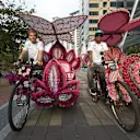 Mercedes' Nico Rosberg and Lewis Hamilton ride trishaws, Kuala Lumpur, Malaysia, March 2014 © Daimler AG