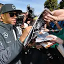 Lewis Hamilton (GBR) Mercedes AMG F1 signs autographs for the fans. Formula One World Championship, Rd1, Australian Grand Prix, Preparations, Albert Park, Melbourne, Australia, Thursday, 13 March 2014