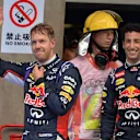 Sebastian Vettel (GER) Red Bull Racing and Daniel Ricciardo (AUS) Red Bull Racing in parc ferme. Formula One World Championship, Rd4, Chinese Grand Prix, Qualifying, Shanghai, China, Saturday, 19 April 2014