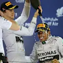 Race winner Lewis Hamilton (GBR) Mercedes AMG F1 celebrates on the podium. Formula One World Championship, Rd3, Bahrain Grand Prix, Race, Bahrain International Circuit, Sakhir, Bahrain, Sunday, 6 April 2014