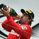 Third placed Fernando Alonso (ESP) Ferrari, drinks champagne on the podium. Formula One World Championship, Rd4, Chinese Grand Prix, Race, Shanghai, China, Sunday, 20 April 2014