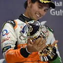 Third placed Sergio Perez (MEX) Force India with his trophy on the podium. Formula One World Championship, Rd3, Bahrain Grand Prix, Race, Bahrain International Circuit, Sakhir, Bahrain, Sunday, 6 April 201