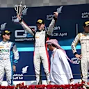 Second placed Julian Leal (COL) Carlin, race winner Stoffel Vandoorne (BEL) ART Grand Prix and third placed Jolyon Palmer (GBR) DAMS celebrate on the podium. GP2 Series, Rd1, Bahrain International Circuit, Sakhir, Bahrain, 3-6 April 2014