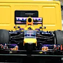 The stricken car of Sebastian Vettel (GER) Red Bull Racing RB10 is brought back to the pitlane after he stopped early in Q3. Formula One World Championship, Rd5, Spanish Grand Prix, Qualifying, Barcelona, Spain, Saturday, 10 May 2014