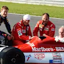 Sebastian Vettel (GER) Red Bull Racing, Niki Lauda (AUT) Mercedes AMG F1 Non-Executive Chairman, Gerhard Berger (AUT) and Dr Helmut Marko (AUT) Red Bull Motorsport Consultant with the BRM P160b. Formula One World Championship, Rd8, Austrian Grand Prix, Qualifying, Spielberg, Austria, Saturday, 21 June 2014