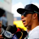 Lewis Hamilton (GBR) Mercedes AMG F1 is interviewed by the media. Formula One World Championship, Rd11, Hungarian Grand Prix, Preparations, Hungaroring, Hungary. Thursday, 24 July 2014 © Sutton Images. No reproduction without permission