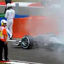 Lewis Hamilton (GBR) Mercedes AMG F1 W05 with a fire in Q1. Formula One World Championship, Rd11, Hungarian Grand Prix, Qualifying, Hungaroring, Hungary. Saturday, 26 July 2014 © Sutton Images. No reproduction without permission