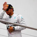 Lewis Hamilton (GBR) Mercedes AMG F1 on the podium. Formula One World Championship, Rd10, German Grand Prix, Race Day, Hockenheim, Germany, Sunday, 20 July 2014 © Sutton Images. No reproduction without permission