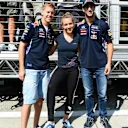 Sebastian Vettel (GER) Red Bull Racing and Daniel Ricciardo (AUS) Red Bull Racing with Red Bull Street Style footballer Kitti Szasz (HUN). Formula One World Championship, Rd11, Hungarian Grand Prix, Preparations, Hungaroring, Hungary. Thursday, 24 July 2014 © Sutton Images. No reproduction without permission